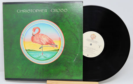 Vinyl record with green cover featuring a flamingo and 'Christopher Cross' text