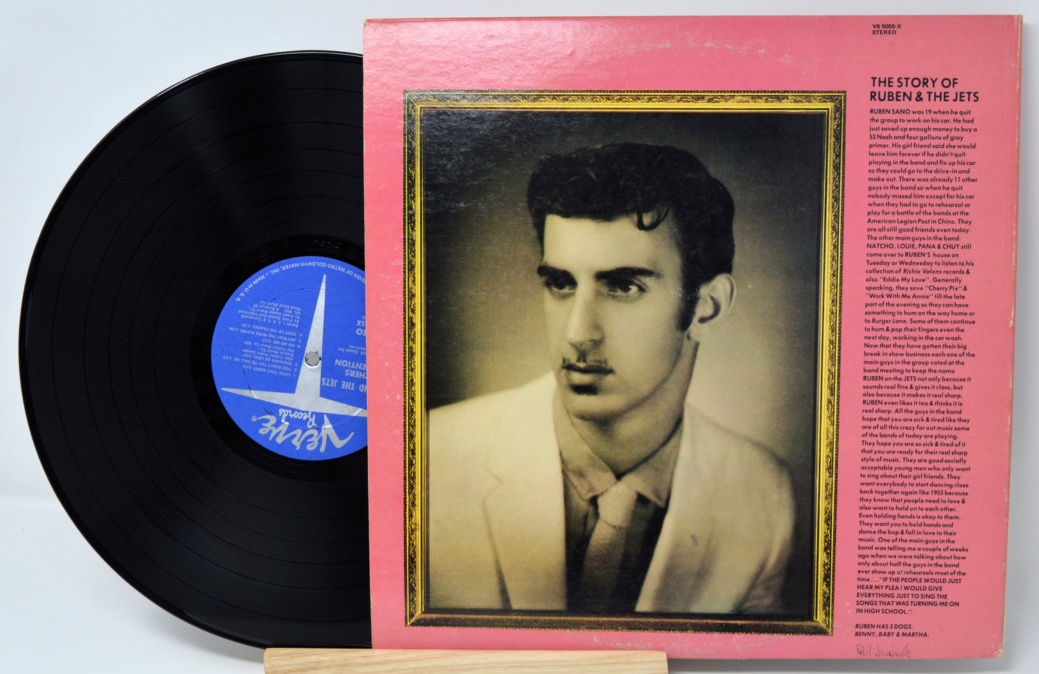 Front cover of Cruising with Ruben & The Jets vinyl LP featuring a vintage portrait photo and album story text