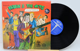 Colorful cartoon artwork on the Cruising with Ruben & The Jets vinyl LP cover showing the band with instruments