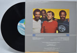 Vinyl record 'Crusaders Standing Tall' with a cover featuring four men and text on a gray background