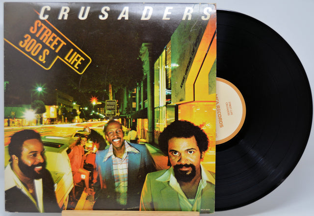 Vinyl record with cover featuring 'Crusaders' and 'Street Life' on a black background