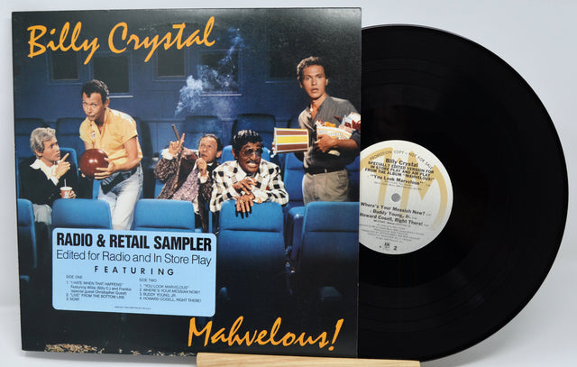 Vinyl record with cover featuring Billy Crystal and text 'Radio & Retail Sampler' on a white background
