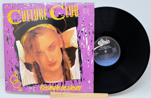 Vinyl record with 'Culture Club' album cover featuring a person with braided hair.