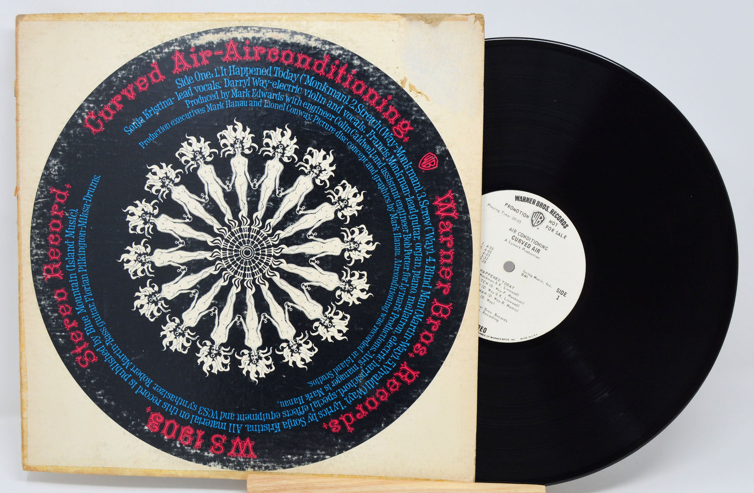 Back cover of Curved Air Air Conditioning vinyl LP showing intricate psychedelic design and tracklist