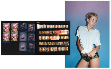 Miley Cyrus album 'Bangerz' cover art featuring Miley Cyrus in a outfit against a backdrop with pink neon lights and greenery.