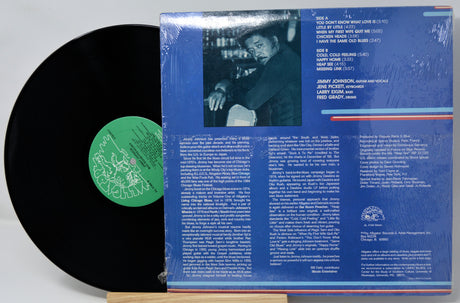 Vinyl record with blue cover featuring a person and text