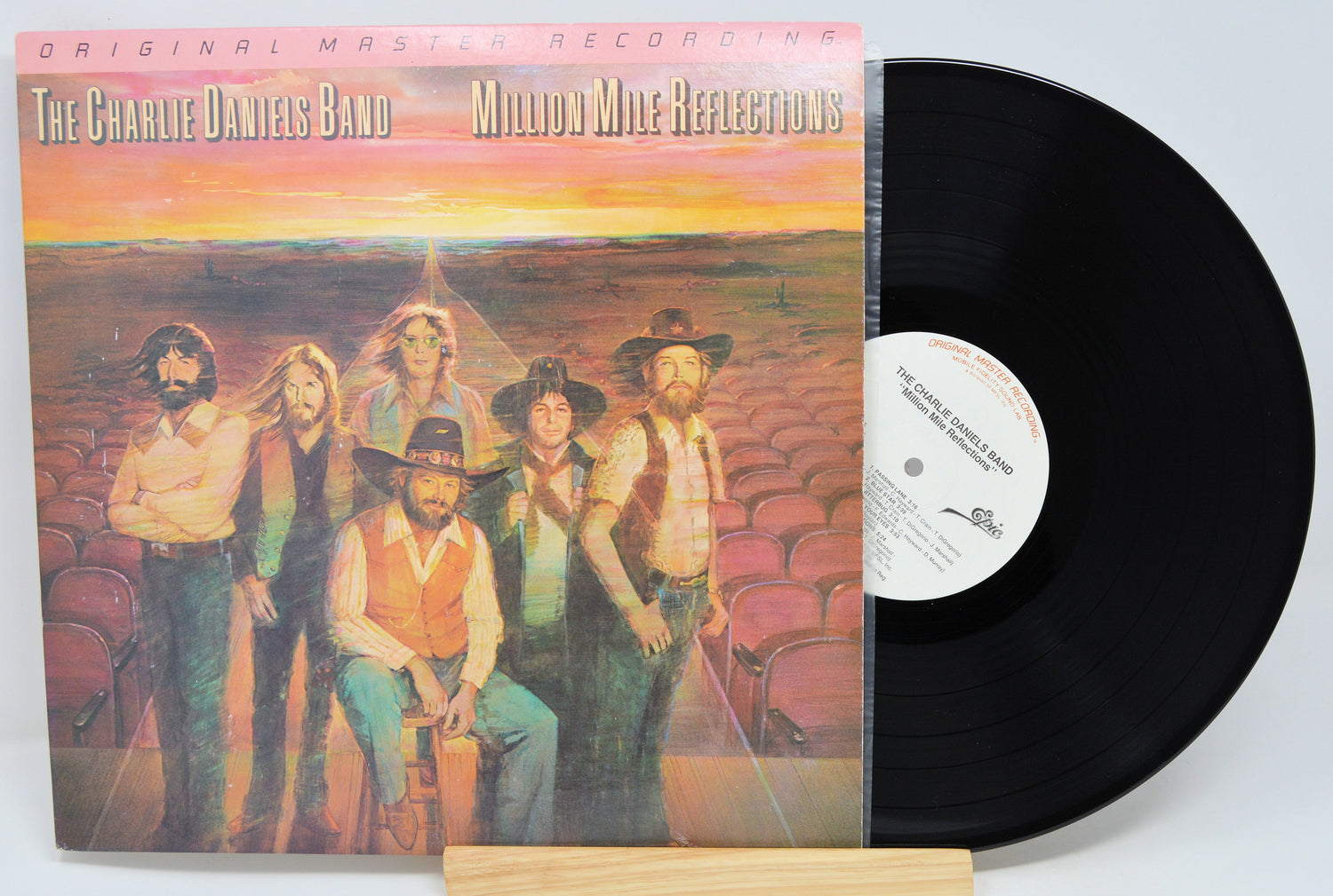 Vinyl record with cover featuring The Charlie Daniels Band and 'Million Mile Reflections' text.