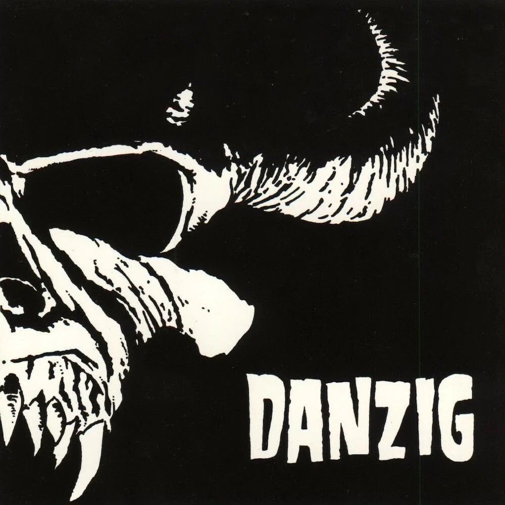Black and white illustration of a skull with horns and the word 'DANZIG' below on a black background.