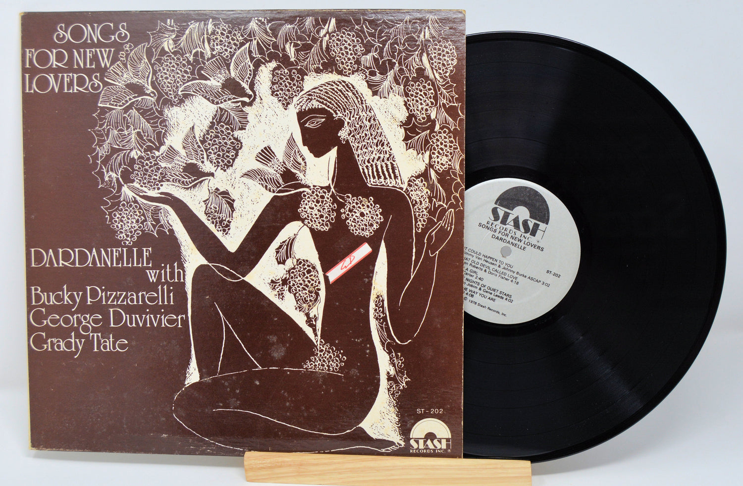 Front cover of 'Songs for New Lovers' vinyl LP by Dardanelle with stylized artwork and visible record
