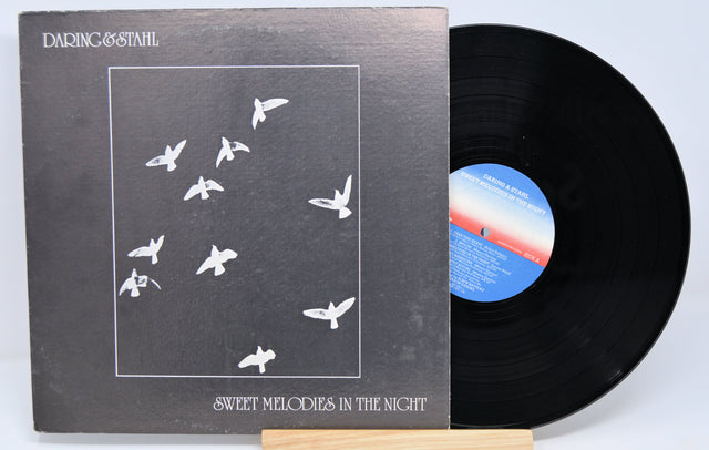 Vinyl record by Daring & Stahl called ' Sweet Melodies In The Night' with a front cover showing birds flying on a black background.