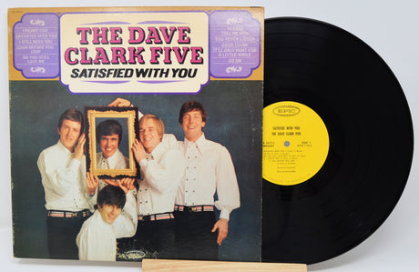 Vinyl record with cover featuring 'The Dave Clark Five' and a portrait of four men.