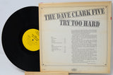 Vinyl record with 'The Dave Clark Five Try Too Hard' cover on a light gray background