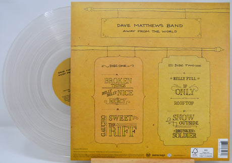 Dave Matthews Band 'Away From The World' vinyl record LP shown with the back cover in yellow and a translucent clear vinyl record partially visible on the left.
