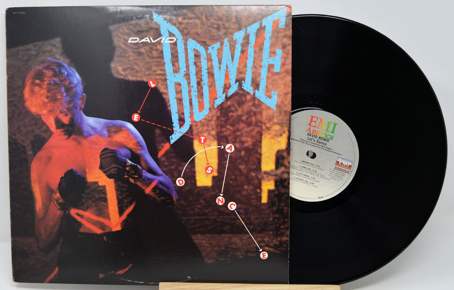 Vinyl record with cover featuring a stylized human figure and 'David Bowie' text.