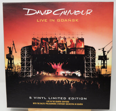 David Gilmour 'Live in Gdansk' 5 Vinyl Limited Edition LP album cover, displayed on a wooden surface against a light gray background.