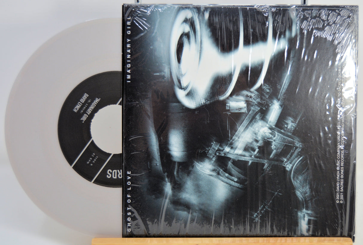 David Lynch silver Vinyl record of Ghost of Love with a black and white back cover featuring a mechanical design