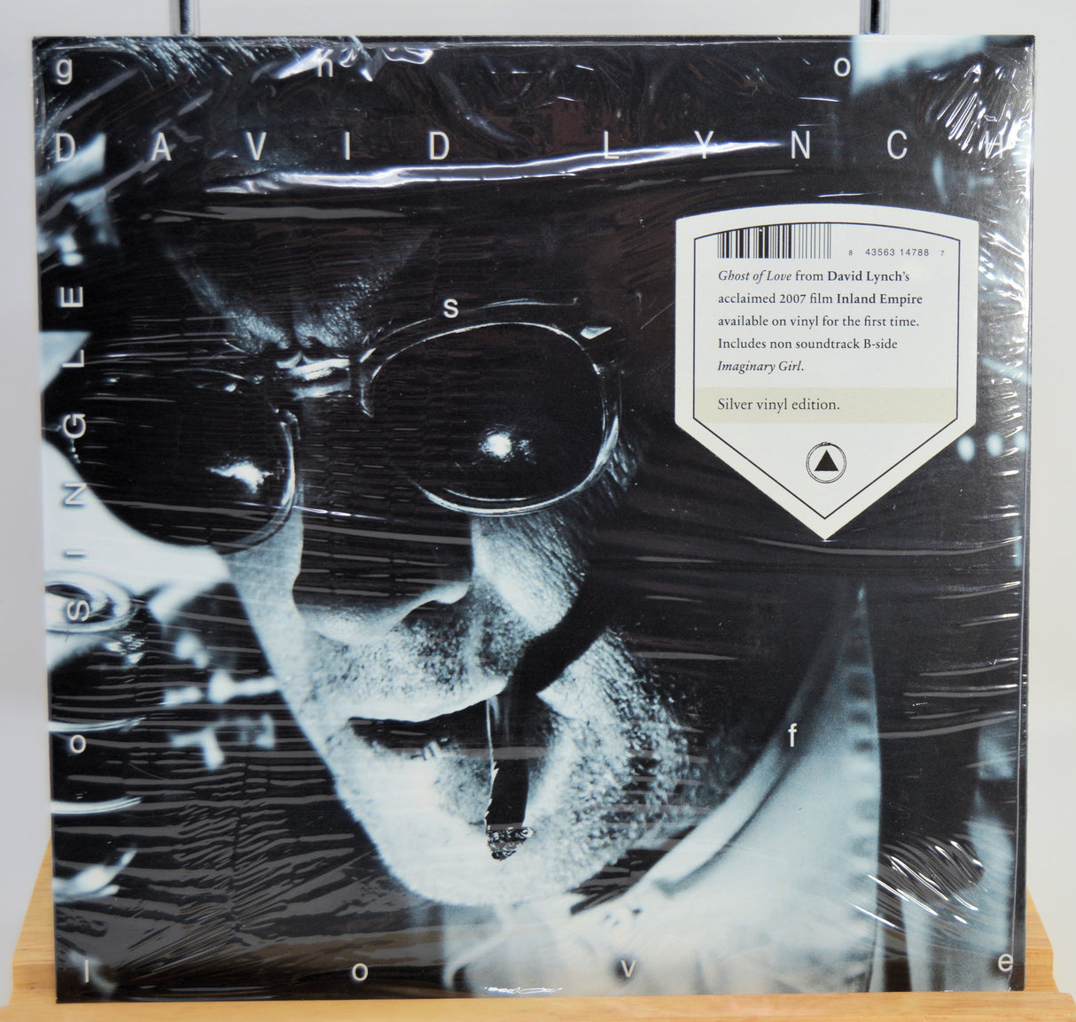 Vinyl record cover with black and white portrait and text, featuring the name 'David Lynch'.