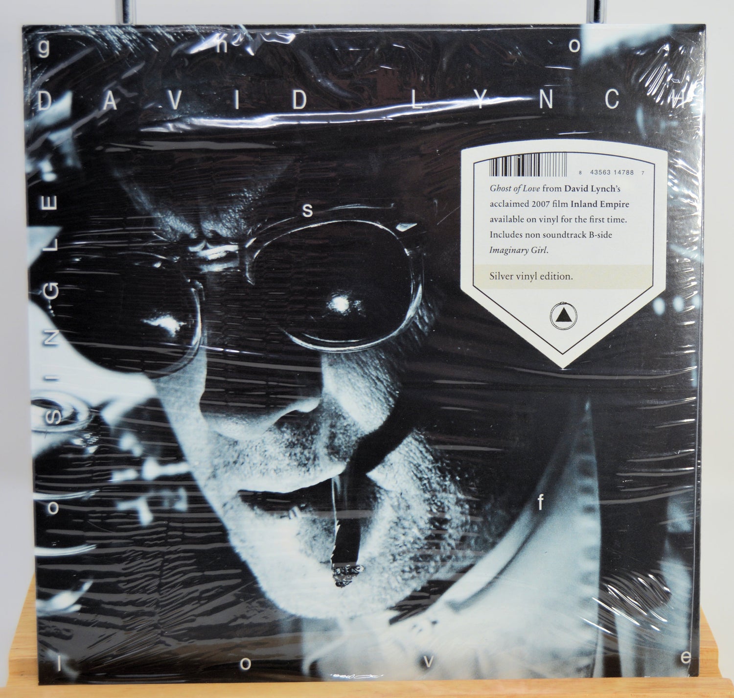 Vinyl record cover with black and white portrait and text, featuring the name 'David Lynch'.