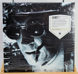 Vinyl record cover with black and white portrait and text, featuring the name 'David Lynch'.