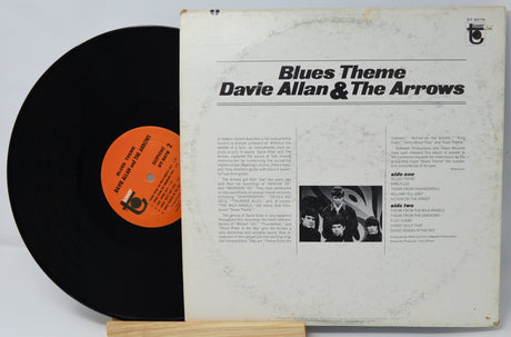 Vinyl record with cover featuring 'Blues Theme' by Davie Allan & The Arrows on a light gray background.