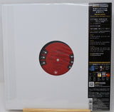 Japanese import of Miles Davis 'Round About Midnight' vinyl record in its original shrink wrap and packaging, featuring a red and black label on a white sleeve with detailed Japanese text.
