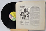 Vinyl record with cover featuring text and a yellow label