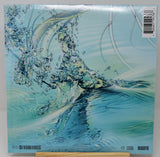 Abstract water splash with vibrant reflections from The Weeknd's Dawn FM vinyl album art