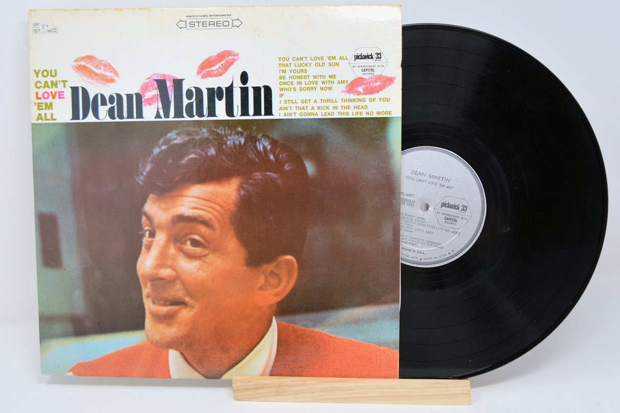 Vinyl record with cover featuring a portrait of Dean Martin on a white background