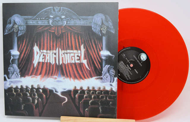 Red vinyl record with 'Death Angel' album cover featuring an audience and stage design.