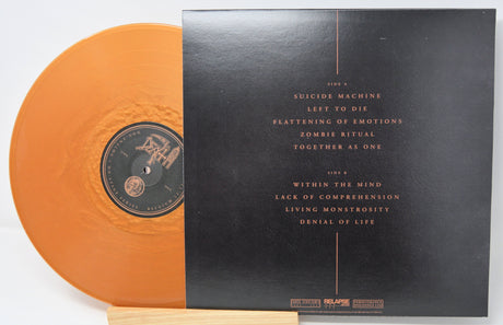 Back cover and orange vinyl of Death 'Non Analog: On Stage Series, Belgium 1991' LP with tracklist