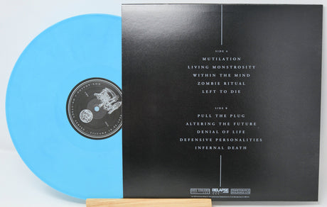 Back cover and tracklist of Death Tijuana 1990 blue vinyl LP