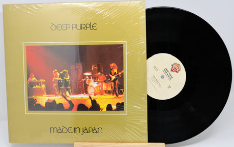 Vinyl record with 'Deep Purple Made in Japan' cover on a white background