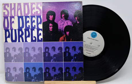 Vinyl record with 'Shades of Deep Purple' album cover featuring band members.
