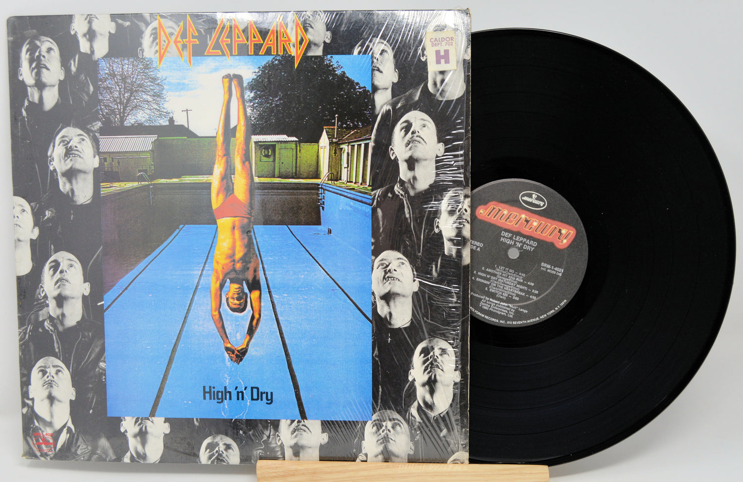Vinyl record with cover titled 'High n' Dry' by Def Leppard on a white background