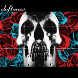 Limited edition vinyl record of Deftones self-titled album with a cover featuring a skull surrounded by red and blue roses.