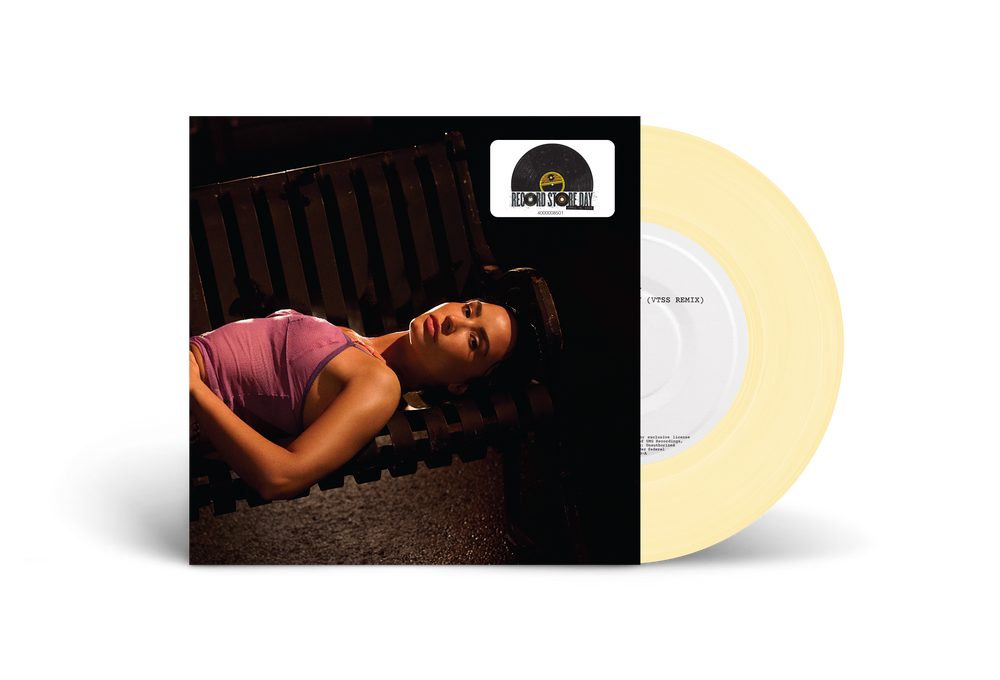 Vinyl record with a cover featuringDemi Lovato lying on a bench.
