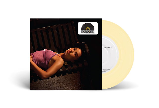 Vinyl record with a cover featuringDemi Lovato lying on a bench.