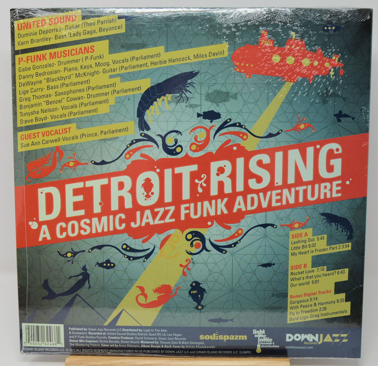 Back cover of Detroit Rising: A Cosmic Jazz Funk Adventure vinyl with album credits and tracklist
