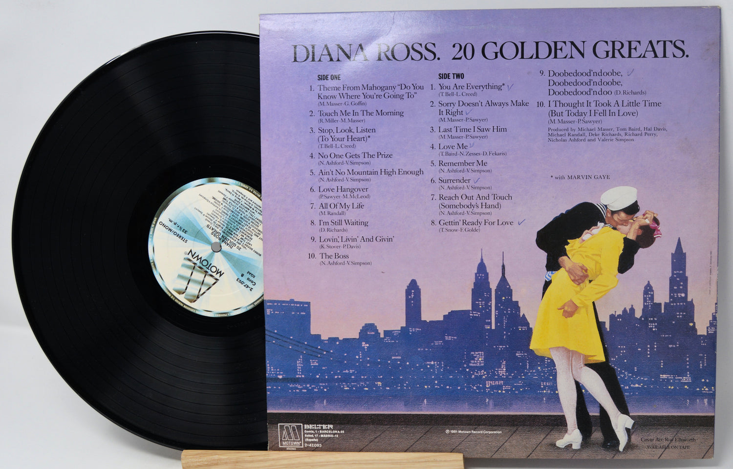 Vinyl record with cover featuring Diana Ross and a cityscape design.