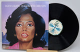Vinyl record with cover featuring Diana Ross and '20 Golden Greats' text.