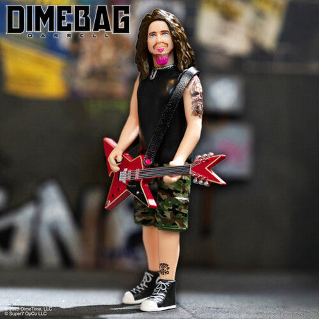 Dimebag Darrell action figure holding a red electric guitar on a blurred rock music background