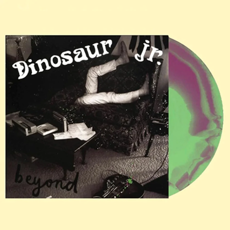 Vinyl record with 'Dinosaur Jr.' album cover featuring a person sitting and writing.