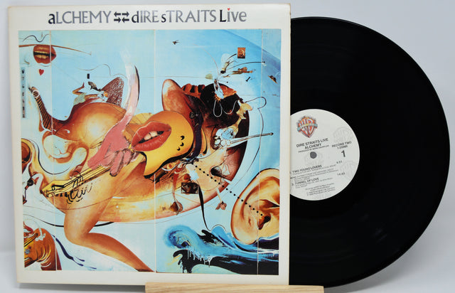 Vinyl record with colorful cover featuring artistic design and 'Alchemy Dire Straits Live' text.