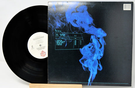 Vinyl record with a blue smoke design on the cover