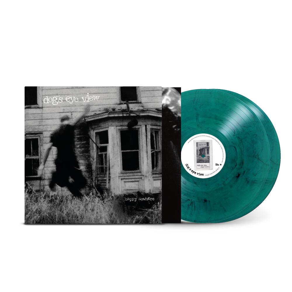 Vinyl record with a black and white album cover featuring a house and person.