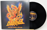 A vinyl record and its album cover for Dokken's 'The Lost Songs: 1978-1981'. The cover features a vibrant orange and yellow phoenix illustration on a dark background, with the band's name in a bold yellow font.