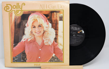 Front cover of Dolly Parton's All I Can Do vinyl LP with artist in red polka dot outfit