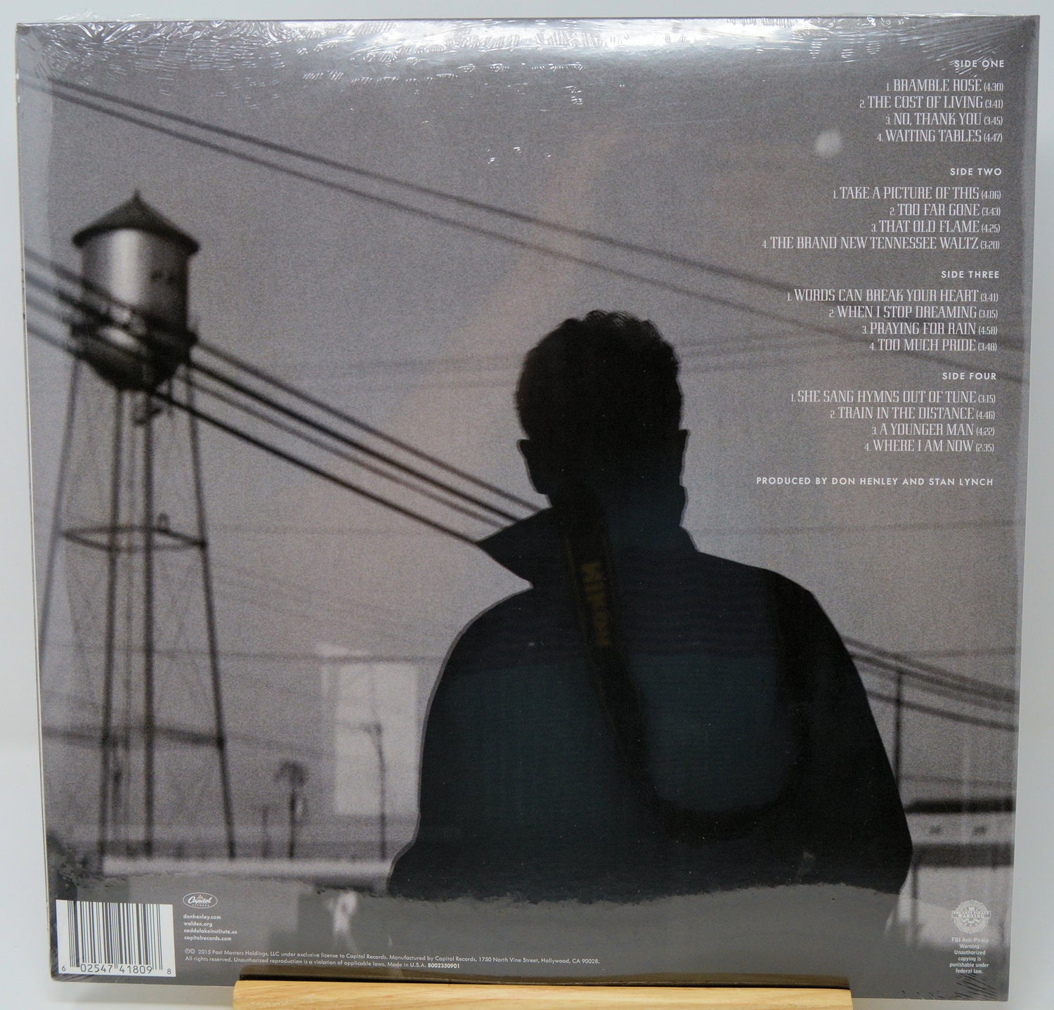 Back cover of a vinyl record sleeve for Timbaland's album 'This Is What I Want', showing a grayscale photo of a person from behind in front of a water tower, with tracklist text on the right.