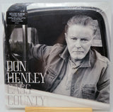 Don Henley 'Cass County' deluxe album vinyl record in its shrink wrap packaging, featuring a black and white portrait of the artist in a car.