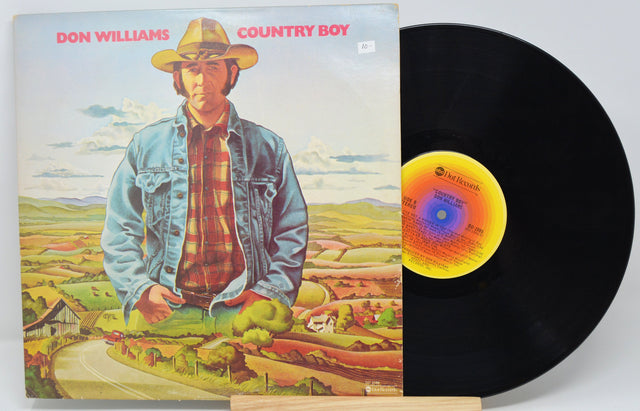 Front cover of Don Williams' Country Boy vinyl LP featuring illustrated portrait and scenic countryside